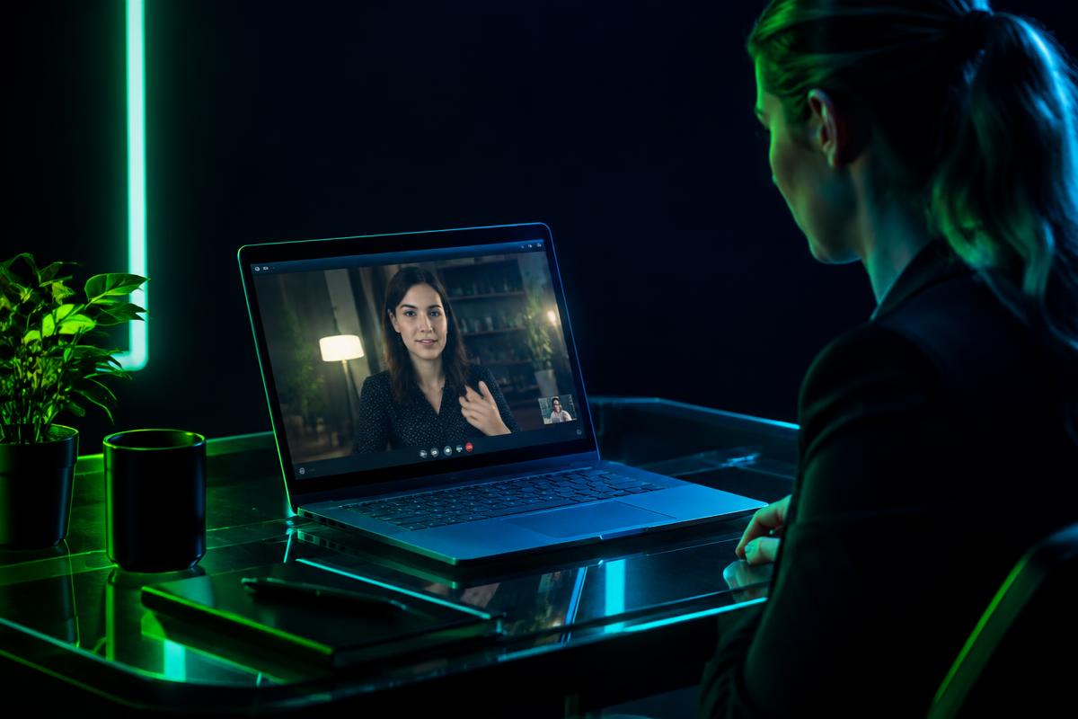 Video call consulting session on a laptop